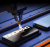 imgi_30_SZKLO-HARTOWANE-na-EKRAN-WYSWIETLACZ-DIAMOND-GLASS-9H-do-Apple-iPhone-17E-Grubosc-szkla-0-3-mm.png