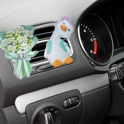 Od-wie-acz-powietrza-do-samochodu-klipsy-wentylacyjne-z-ywic-kaczka-samochodowe-klipsy-zapachowe-przeno-ne.jpg_ (1).webp